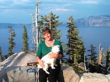 Waterfall Hwy, OR - Me & my dog sitting in front of Crater Lake
