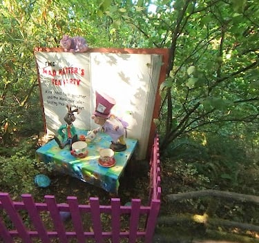 Salem, OR - Enchanted Forest with fairytale scenes on the wooded paths like Mad Hatter's tea party