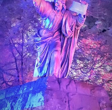 Portland, OR - Lifesize statue of Jesus holding the cross, lit up for Christmas