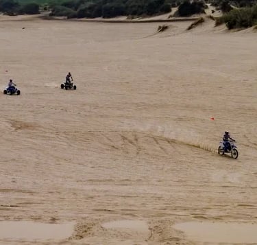 Oregon Coast -People on atv's & motorcycles on Winchester Bay's sand dunes