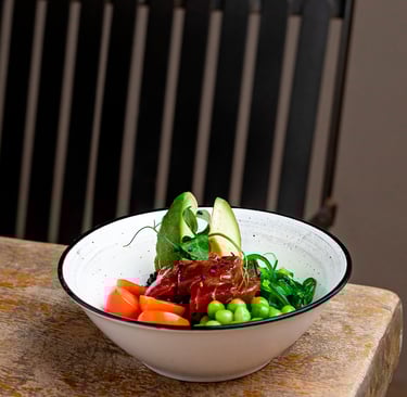 a bowl of food with vegetables and vegetables