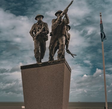 a statue of two soldiers on a pedestal