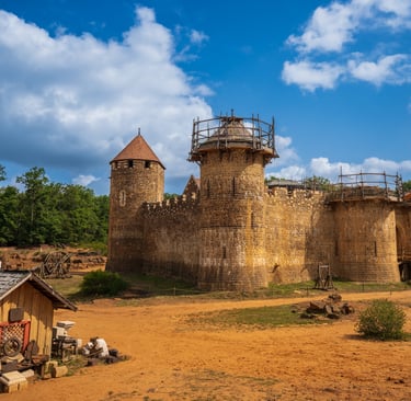 a castle like structure with a tower in the middle of the picture