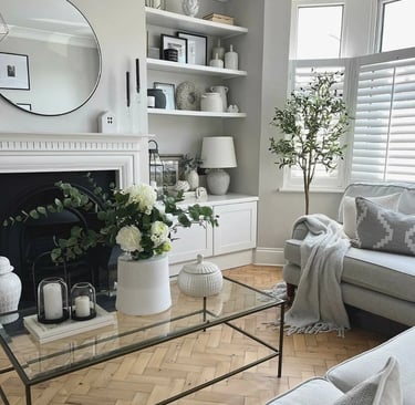 a living room with a fireplace and a couch