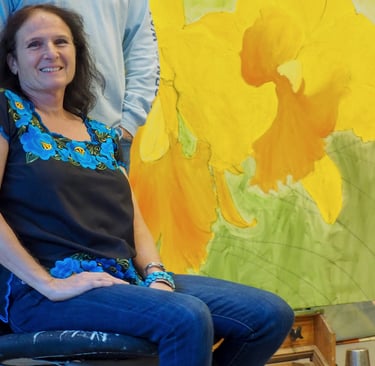 Christine Knize with a Painting in Progress