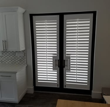 French Door Shutters, with rectangular cut out. Other options would be a semicircle