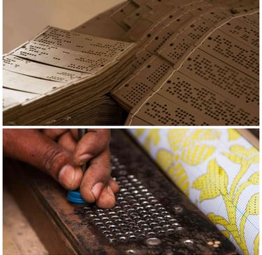 a person holding a tool to design cards in their hand