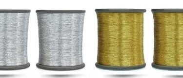a set of three spools of different colors of thread thread thread thread thread