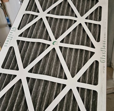 This furnace filter needs to go! Be sure to change yours AT LEAST twice a year!