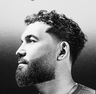 Stylish bearded man after a fresh haircut at StylishCut Salon in Sharjah – modern grooming and sharp