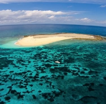 Latham Island Fishing Charters Zanzibar - Rocky coastline and crystal-clear waters of Latham Island