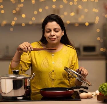 a woman enjoying the smell of a food
