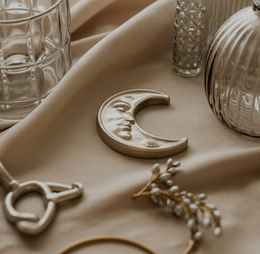 a table with a lot of glassware and a crescent shaped object