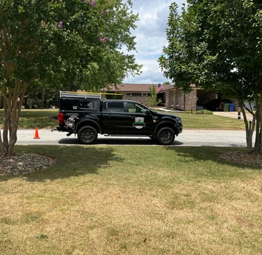 TLC Upstate Lawn and Pest service truck
