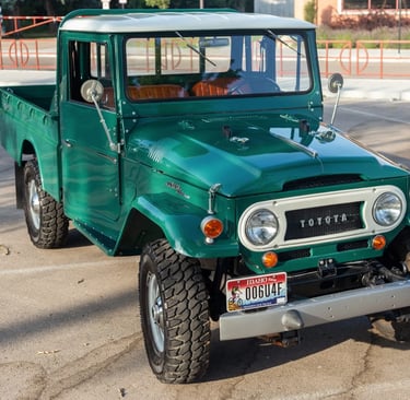 An image of a green 1967 Toyota Land Cruiser Pickup