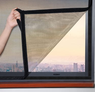 A balcony door secured with a custom mosquito net, blending seamlessly with the home’s design