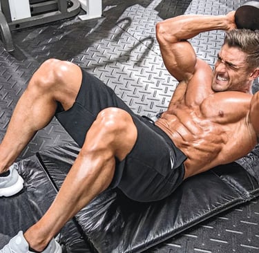 a man doing a crunch barbell exercise