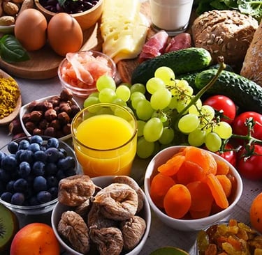 a variety of foods and drinks on a table