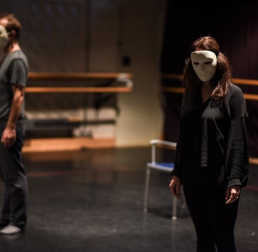 two actors in neutral masks at a 'feldenkrais for actors' workshop