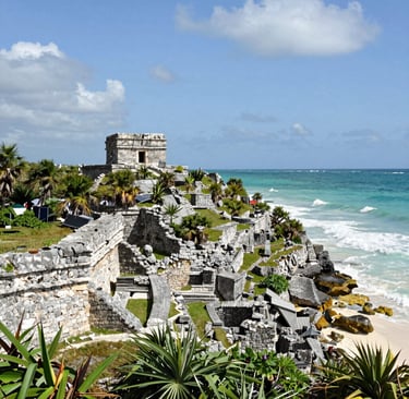 Close-up of intricate Mayan carvings on a temple wall at Tulum.