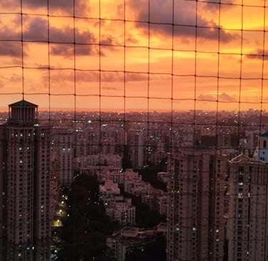 a view of a city at sunset