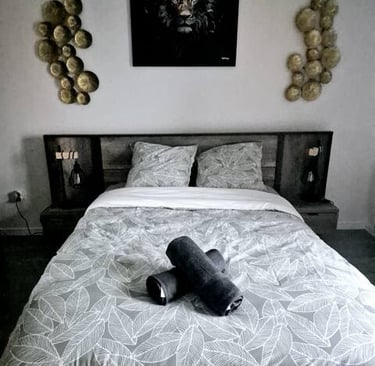 a bed with a towel on top of it