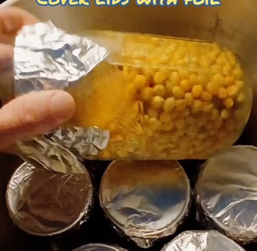 corn grain jars being loaded in pressure cooker
