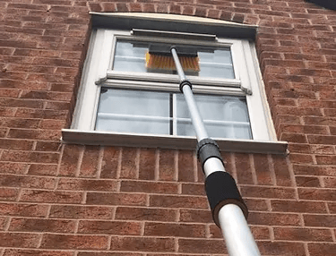 window being professionally cleaned in Malvern