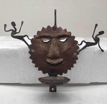 "Handcrafted iron oil lamp with sun face and two tribal figures-for export markets"