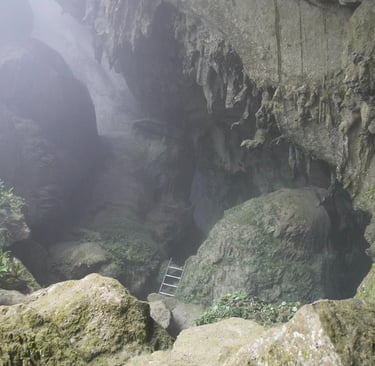 Metal ladders down to the entrance of Hang Son Doong Cave , Ke Bang National Park, Vietnam