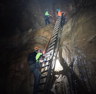 Fixed ladder at the base of the great wall of vietnam, hang son doong cave, vietnam