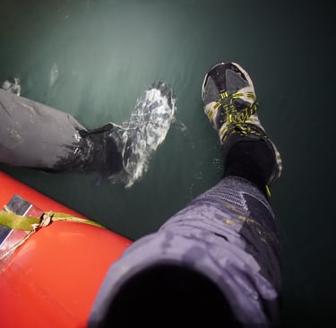 getting our shoes cleaned on rafts in passchendaele in hang son doong cave, vietnam