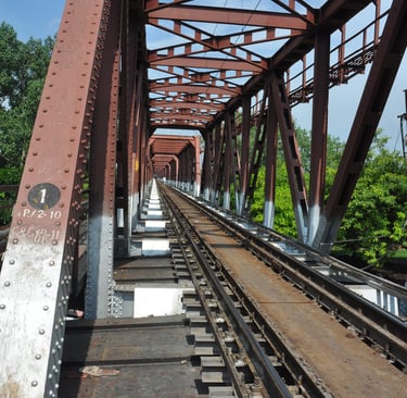 crossing the rail bridge to the Taj mahal, Agra, Utter Pradesh, India