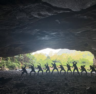 kitting up in the entrance to hang en cave, Ke Bang national park, Vietnam