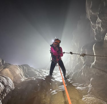 Tracey Billington rappelling into the entrance of Hang Son Doong, Ke Bang National Park, Vietnam