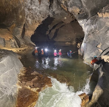 Path leading down to a river crossing in Hang Son Doong Cave, Ke Bang National Park, Vietnam