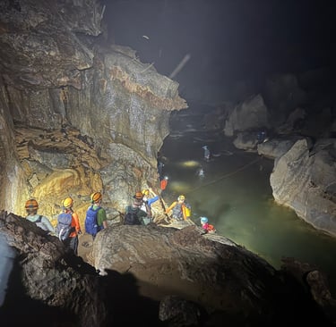 Path leading down to a river crossing in Hang Son Doong Cave, Ke Bang National Park, Vietnam
