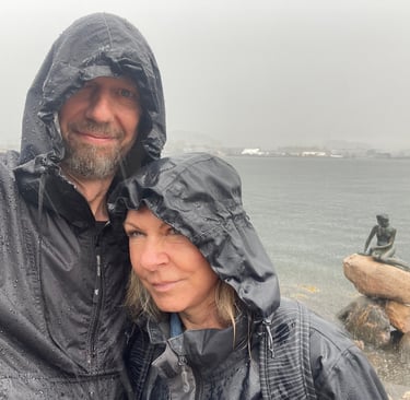 a wet copenhagen and the statue of the little mermaid, Denmark