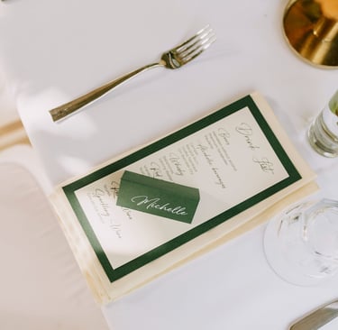 a table with a menu card and a menu