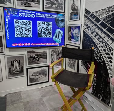 Black and white travel photos surround a 50 inch TV that will display logos or video