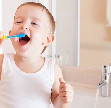 a child brushing teeth