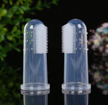 a image showing finger toothbrushes