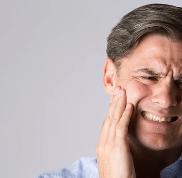 a person keeping hands in jaw due to jaw pain