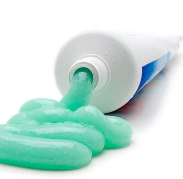 a toothpaste squeezed from the tube
