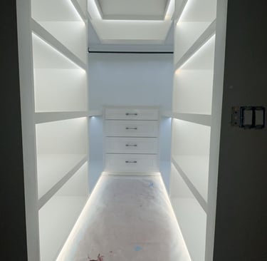 Custom made closet with plenty of drawers and hanging space- Britto's Home Improvement