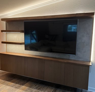 Custom made living room wall unit. Custom made shelved and cabinet- Britto's Home Improvement