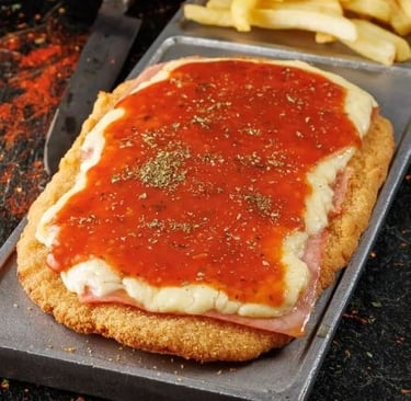 milanesa completa con tomate jamón y queso mozzarella