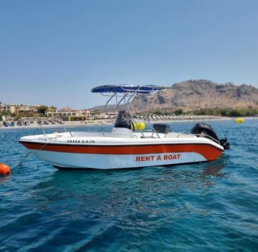 a boat with a red and white in the water