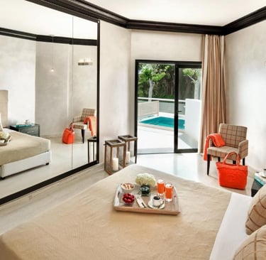 Luxury Mitsis Faliraki Beach hotel room with private pool view.