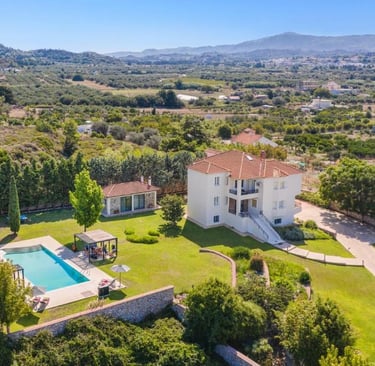 Luxury Greek villa rental with a private swimming pool and scenic mountain views in Rhodes.